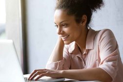 Lady studying on laptop – Accelerate Academy